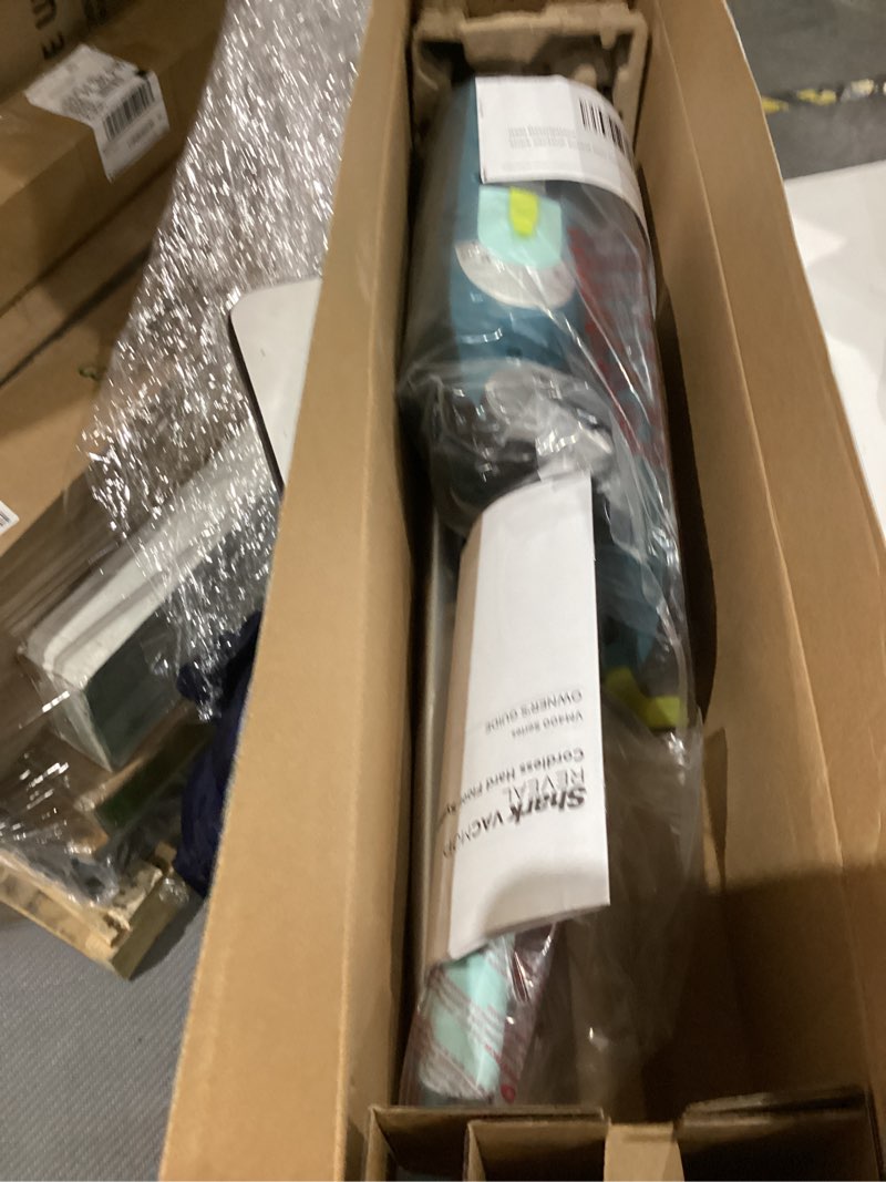 Condition photo showing As Is for Shark VACMOP Reveal New Cordless Hard Floor Cleaner, Vacuum & Spray Mop, Powerful Suction, Lightweight, Illumination Light, Includes 4 Disposable Pads, 12oz Pet Multi-Surface Cleaning Solution, VM401 New Vacmop Reveal With 4 Pads