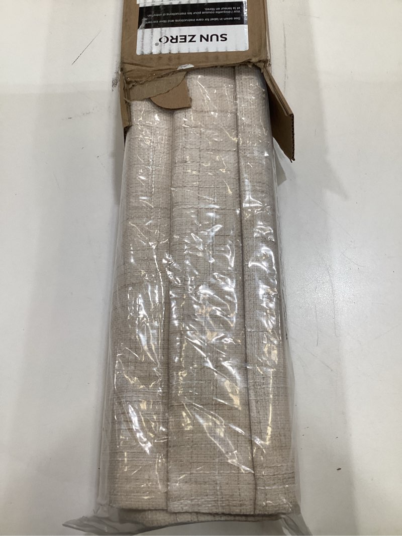Condition photo showing Good Condition for sun zero seraphina textured 100% total blackout cordless roman shade, taupe, 35" w x 64" h taupe 35"w x 64"h