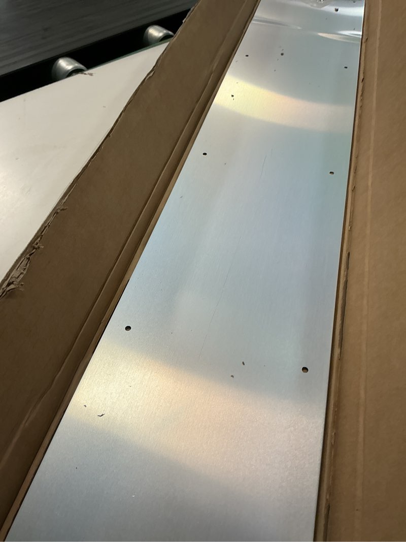 Condition photo showing As Is for door kick plate, 6" x 34" aluminum kick plate, fits 36" doors, satin silver | screw mount installation, rounded corners, metal kick plate for bottom of door, kick plates for exterior doors 6 x 34 inch