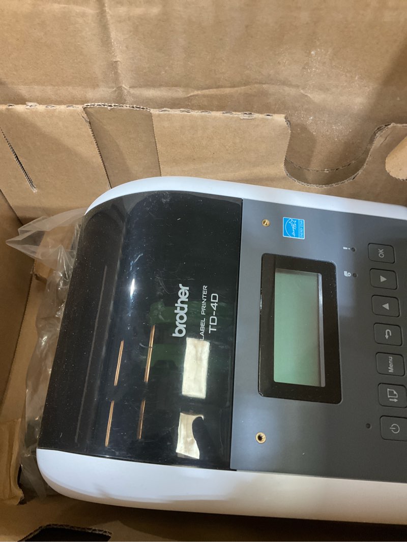 Condition photo showing As Is for Brother TD-4550DNWB 4-inch Thermal Desktop Barcode and Label Printer, for Labels, Barcodes, Receipts and Tags, 300 dpi, 6 IPS, Standard USB and Serial, Ethernet LAN, Built-in Wi-Fi and Bluetooth USB/LAN/Bluetooth/WiFi/Airprint 6.1"x7.1"x8.8"