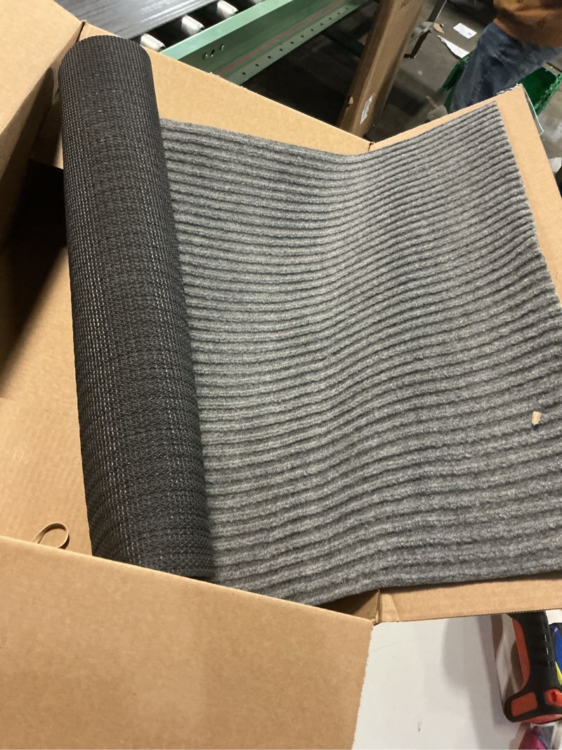 Condition photo showing As Is for ( similar ) LuxUrux Durable Rubber Door Mat - Heavy Duty, Indoor/Outdoor, Easy to Clean, Waterproof, Low-Profile Entry Mat for Entry, Patio, Garage - High Traffic (23'' x 35'', Striped Gray Design) 23''x 35'' Striped Gray