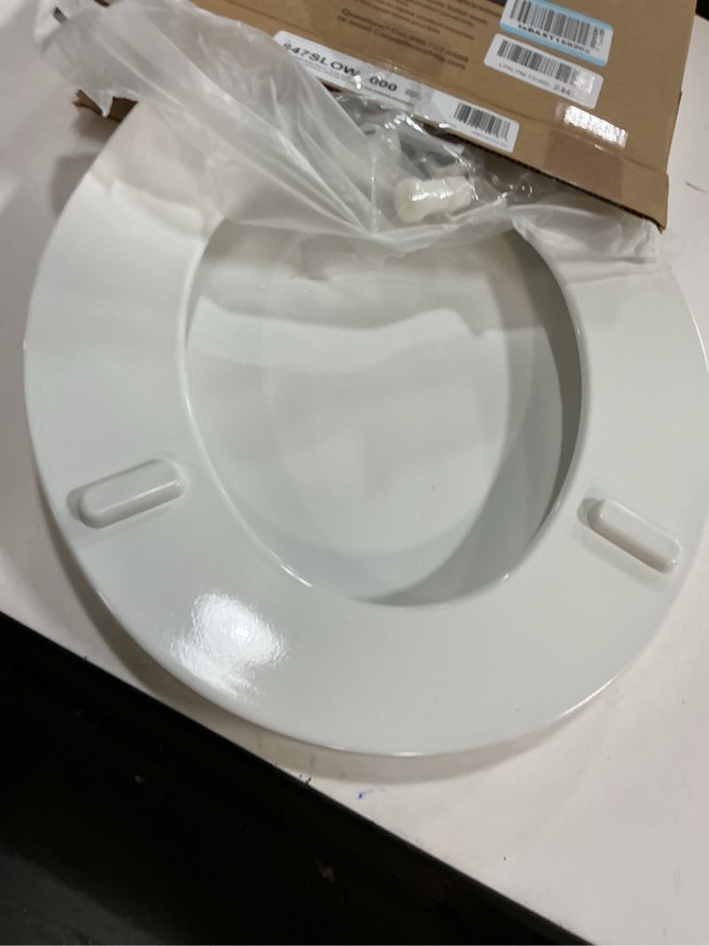 Condition photo showing As Is for Mayfair Cassel Slow Close Toilet Seat, Easy Clean, Non Slip Premium Wood Seat, Easy Install, Made in USA, Round, White