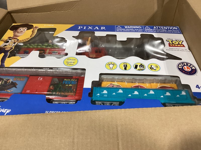 Condition photo showing Good Condition for Lionel Battery-Operated Disney Toy Story Toy Train Set with Locomotive, Train Cars, Track & Remote with Authentic Train Sounds, & Lights for Kids 4+ Ready-to-Play