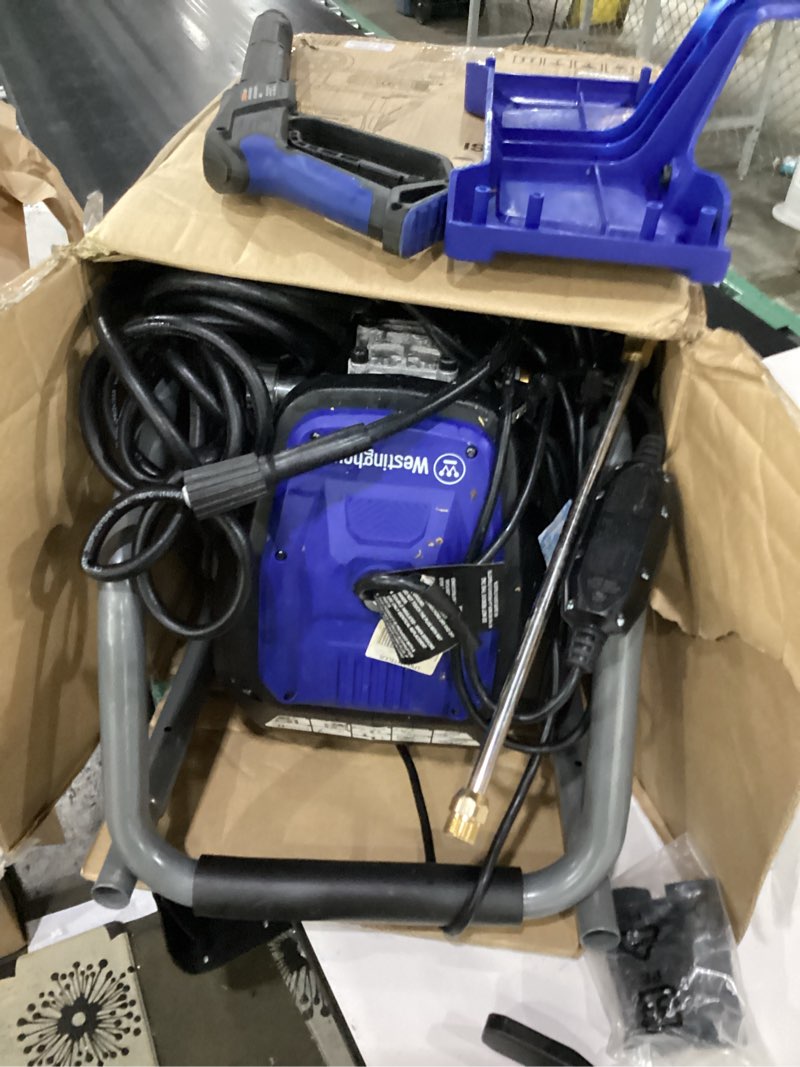 Condition photo showing As Is for missing parts, not tested**** westinghouse wpx3000e electric pressure washer, 3000 max psi and 1.76 max gpm, induction motor, onboard soap tank, spray gun and wand, 5 nozzle set, for cars/fences/driveways/homes/patios/furniture