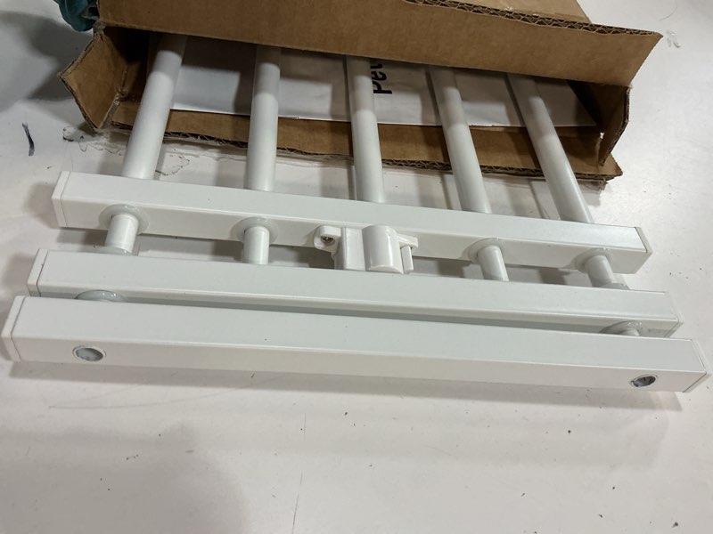 Condition photo showing Good Condition for Malier Dog Gate with a Small Door, Extra Wide All Metal Short Dog Gate Pet Gate for Stairs, 10'' Tall Pressure Mount Easy Step Over Puppy Gate Low Gate for Doorways White 10''H × 26''- 41''W
