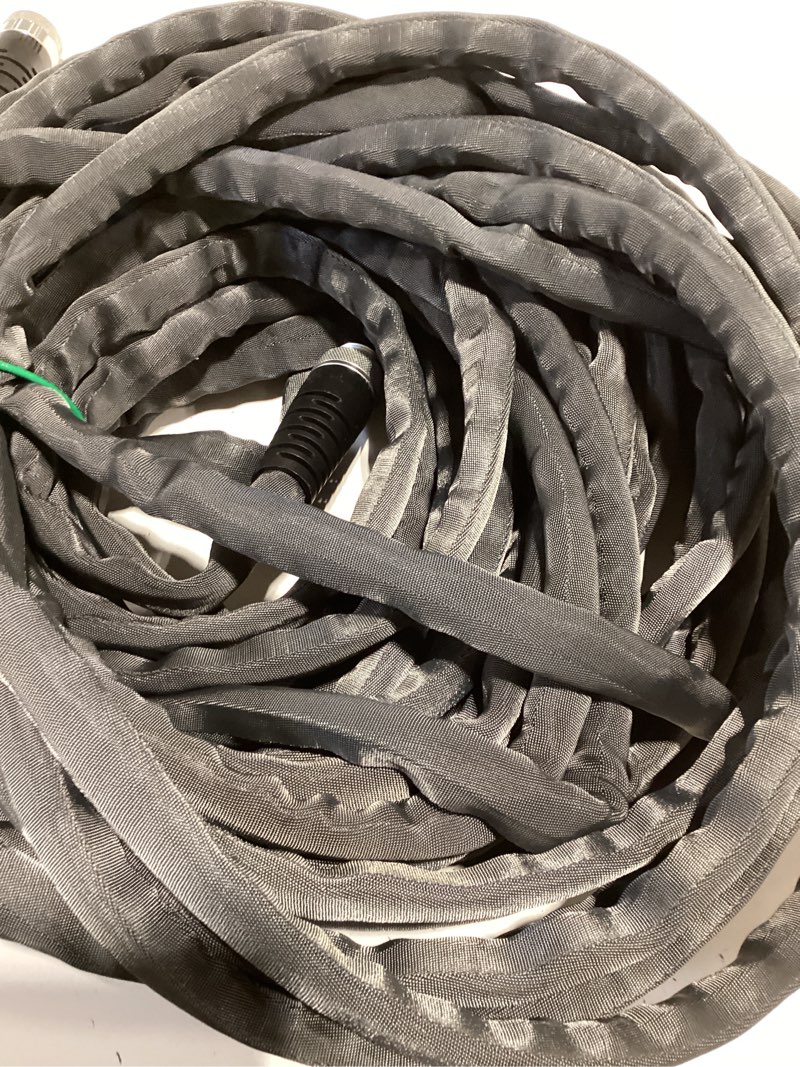 Condition photo showing Good Condition for 100 ft flex hose