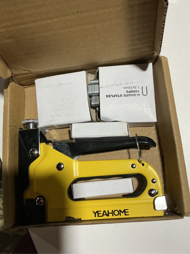 Condition photo showing As Is for Upholstery Staple Gun Heavy Duty, YEAHOME 4-in-1 Stapler Gun with 4000 Staples, Manual Brad Nailer Power Adjustment Stapler Gun for Wood, Crafts, Carpentry, Decoration DIY Yellow, 4-in-1 Staple Gun, with 4000 Staples