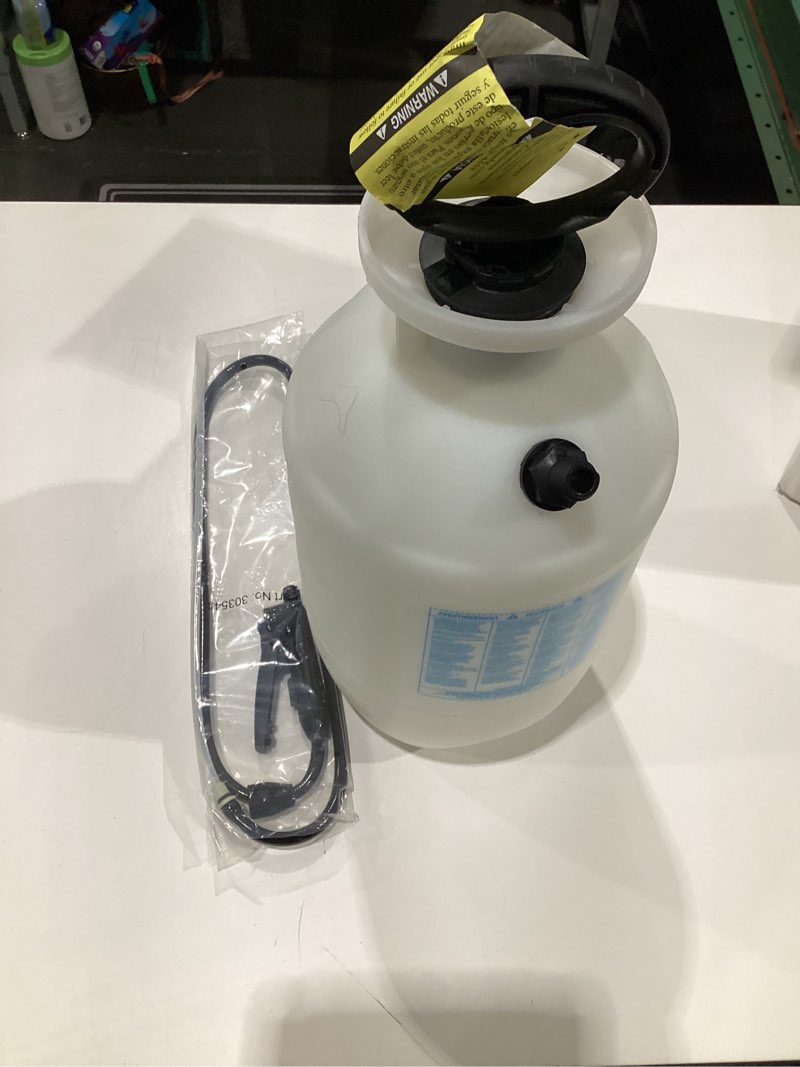 Condition photo showing As Is for Chapin 22074: Made in The USA Disinfectant Bleach Pressure Pump Tank Sprayer, 2-Gallon, Adjustable Cone Nozzle, Compatible with Bleach Solutions and Fungicides, Translucent White