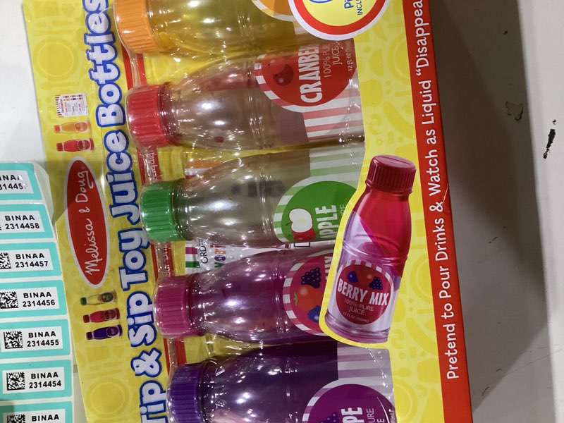 Condition photo showing New/Like New for Melissa & Doug Tip & Sip Toy Juice Bottles and Activity Card (6 Pcs) Pretend Play Food Set, Play Kitchen Food For Ages 3+