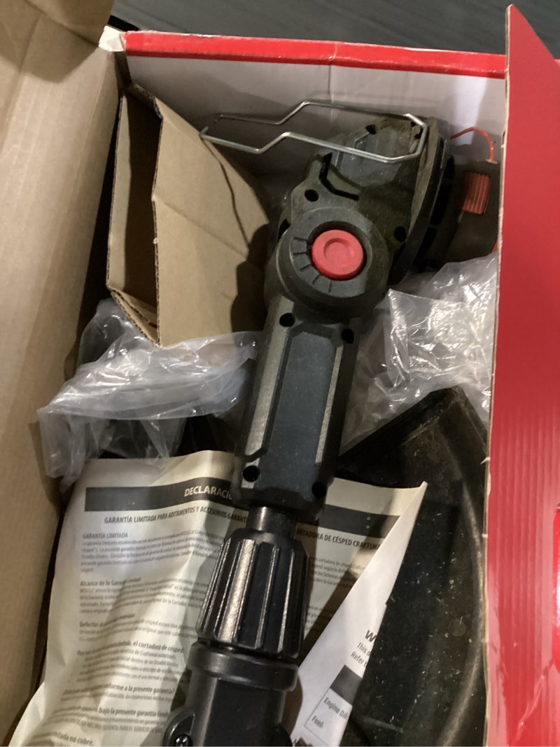 Condition photo showing As Is for hyper tough 12" 20v brushless cordless string trimmer with 20v max 2.0ah battery and charging cable