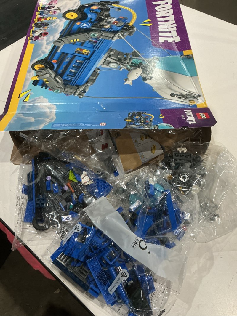 Condition photo showing As Is for open bags, possible missing parts as is!!!     lego fortnite battle bus building toy - collectible fortnite toy for kids, boys & girls, ages 10+ - pretend play set with 9 minifigures from video game - gift for birthdays - 77073
