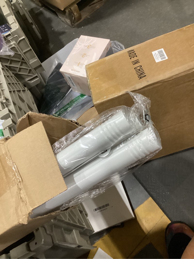 Condition photo showing New/Like New for window rods 