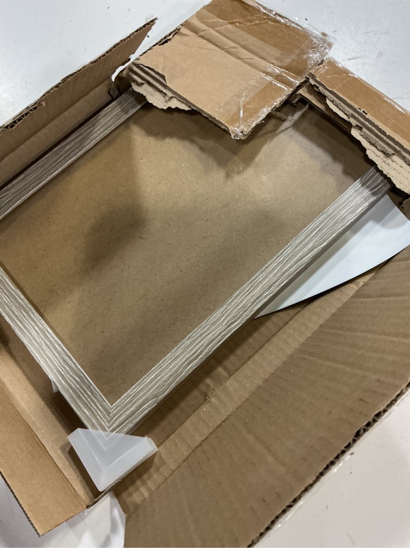 Condition photo showing Good Condition for americanflat 8x12 picture frame with shatter-resistant glass - signature collection - gallery-style frames made of engineered wood - photo frame for tabletop and wall display - driftwood 1 pack driftwood 8x12