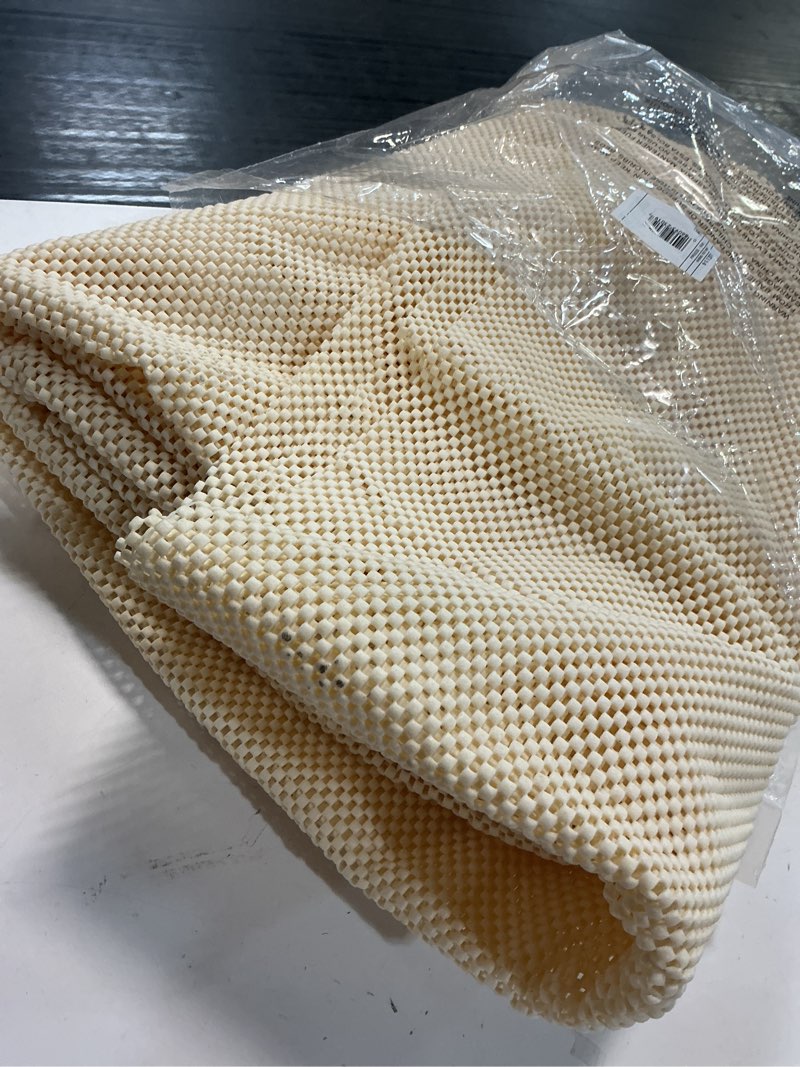 Condition photo showing Good Condition for mohawk home 6'x9'6" comfort grip rug pad ivory: skid-resistant nonslip carpet pad, polyester rectangle
