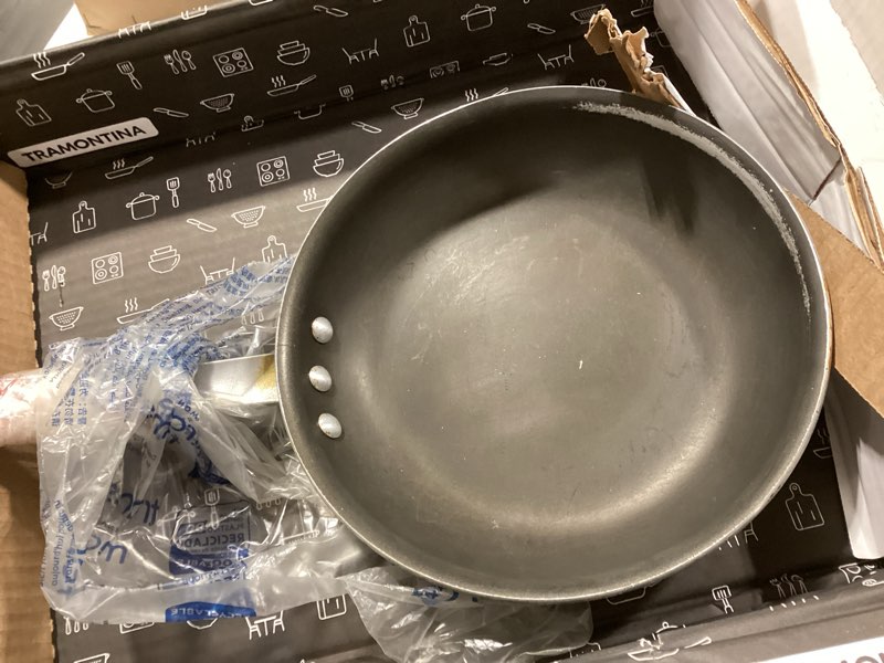 Condition photo showing As Is for Tramontina Professional 10-Inch Non Stick Frying Pan, Heavy-Gauge Aluminum Skillet with Reinforced Nonstick Coating, Red Handle, Dishwasher and Oven Safe Nonstick (Red handle) 10 Inch