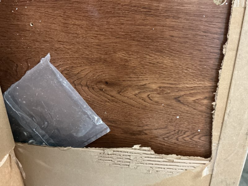 Condition photo showing As Is for Sauder Shoal Creek Storage Chest, Toy Storage Chest for Living Room, Storage Trunk, in Oiled Oak
