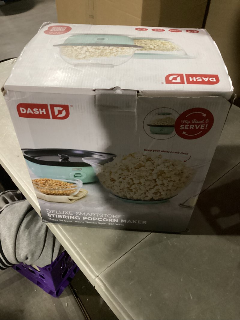 Condition photo showing New/Like New for dash smartstore deluxe stirring popcorn maker - hot oil electric popcorn popper with butter-warming tray, clear serving bowl, storage lid & measuring cup - 24 cups, aqua 24 cups aqua