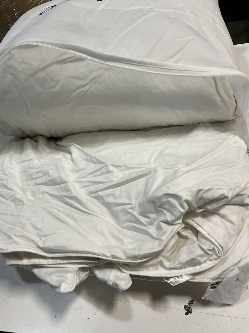Condition photo showing As Is for ultra warm premium down comforter, king/cal king, down