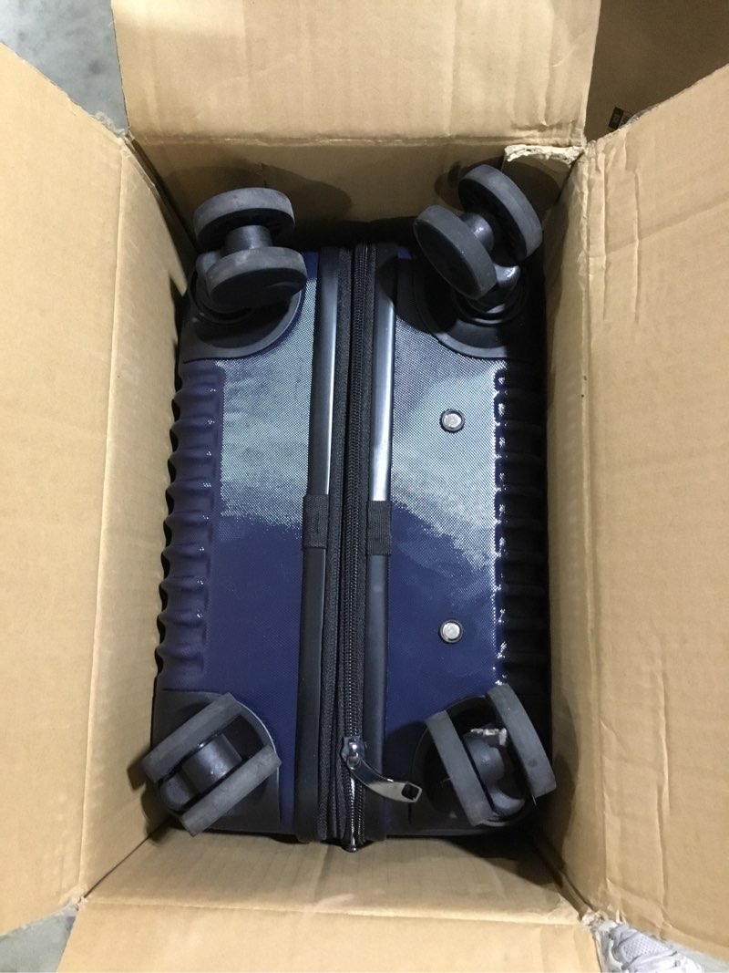 Condition photo showing Good Condition for Amazon Basics 21" Hardside Carry-On Luggage with Multi-directional Wheels, Expandable for Up to 25% More Space, Scratch-Resistant Surface, Organized Interior, Navy Blue