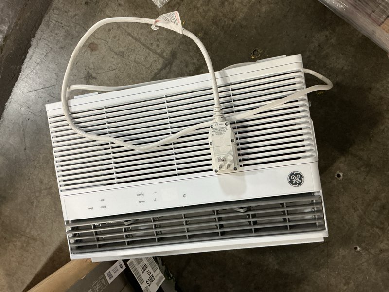 Condition photo showing As Is for 8,000 btu smart window air conditioner for 350 sq. ft. in white with wi-fi and remote