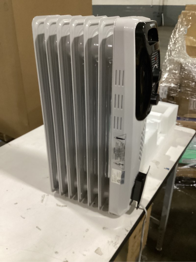 Condition photo showing Good Condition for Amazon Basics Portable Oil Radiator Heater for Indoor Use, 3 Heat Settings, Over-Heat Protection, ETL-certified Safety, 7 Oil-Filled Steel Fins, 1500W, 11"D x 14.8"W x 25.2"H, White