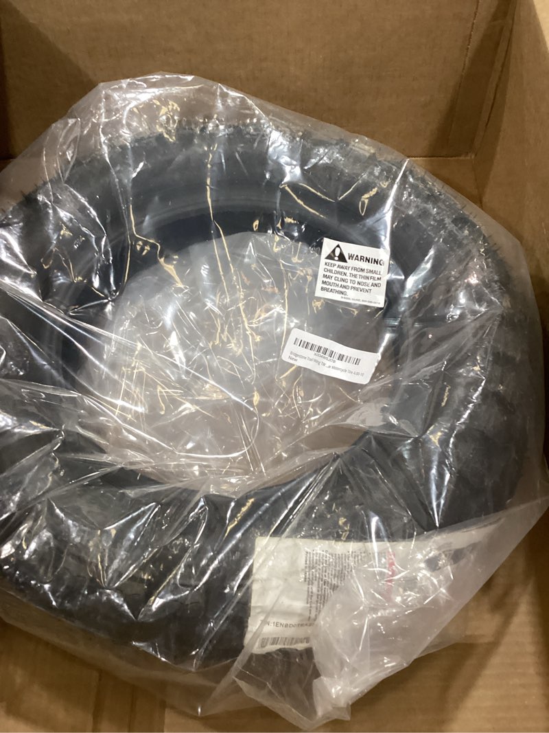 Condition photo showing As Is for Tire