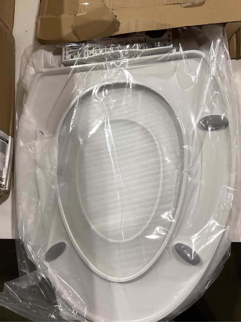 Condition photo showing Good Condition for 1m family toilet seat, patented slow close & quick releasing technology, anti-wiggling, easy to install and clean, standard elongated with toddler seat built in (1 piece) 1 elongated with toddler seat built in
