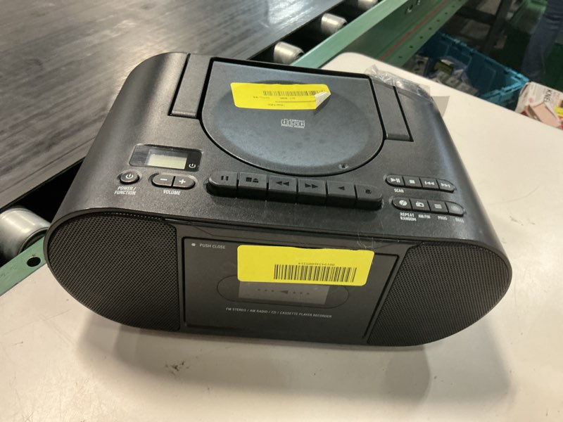 Condition photo showing As Is for onn. portable cd/cassette boombox with bluetooth wireless technology, black