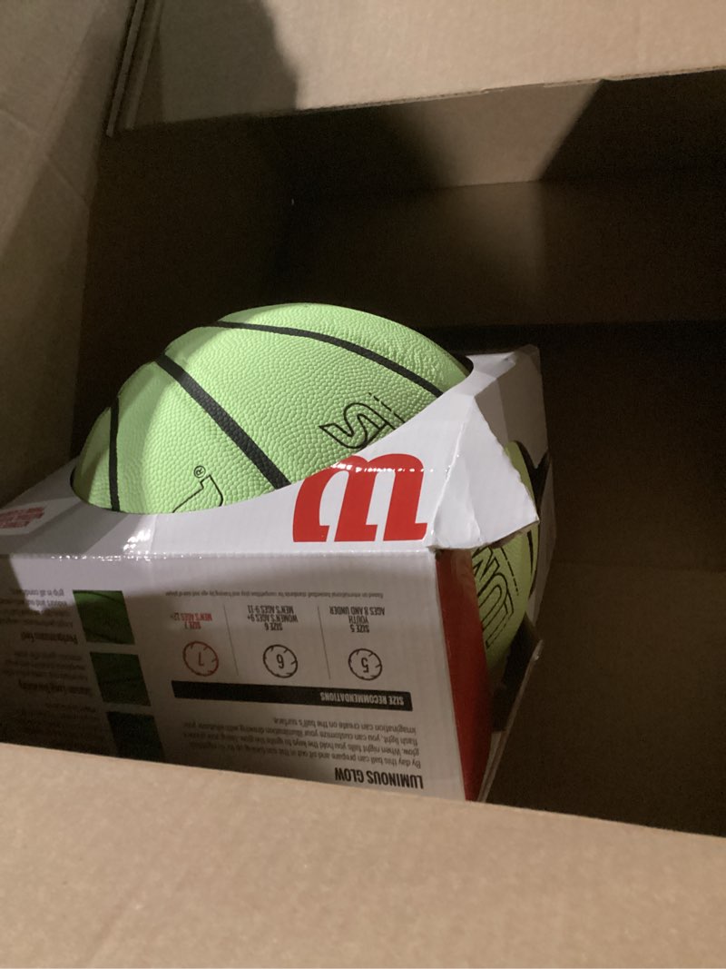 Condition photo showing As Is for WILSON Luminous Glow Basketball