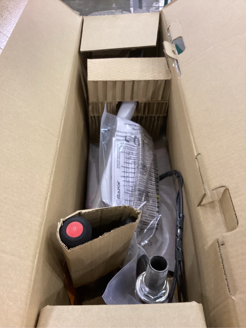 Condition photo showing As Is for Razor Power Core E90 Electric Scooter with hub Motor, Push-Button Throttle, for Kids 8+ Black/Red (Glow) Scooter