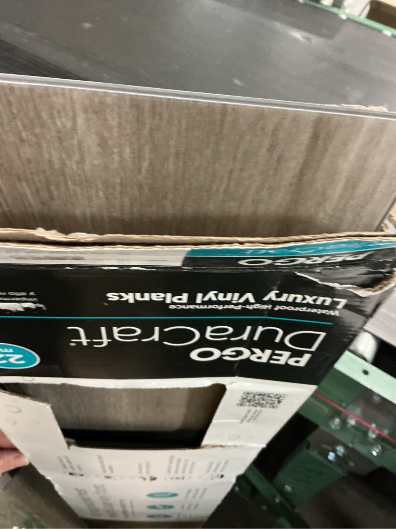 Condition photo showing As Is for pergo duracraft lourdes oak gray 22-mil x 7-1/2-in w x 47-in l waterproof interlocking luxury vinyl plank flooring (17.32-sq ft/ carton)