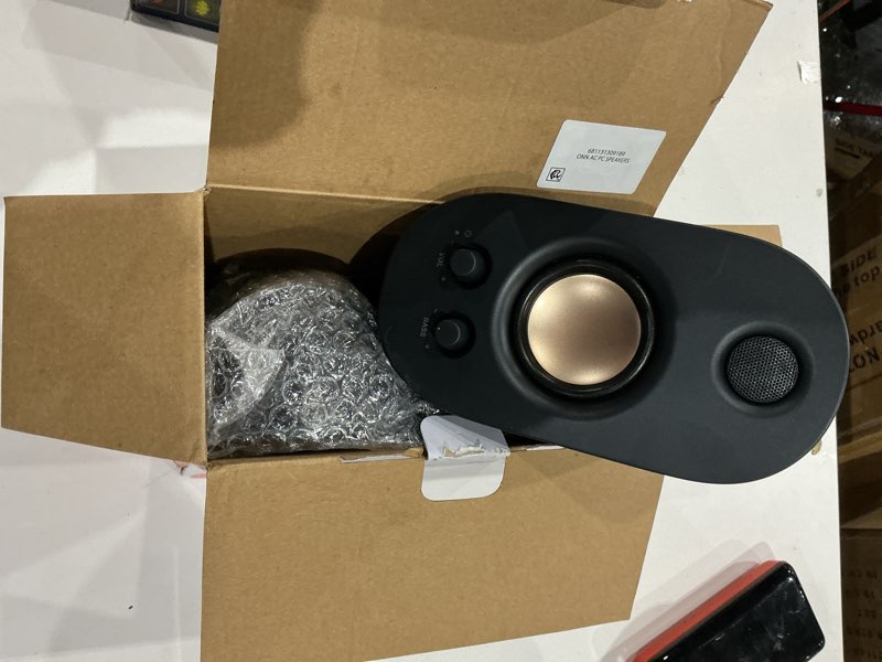 Condition photo showing As Is for onn ac powered computer speakers with volume and bass controls, 7.32" height