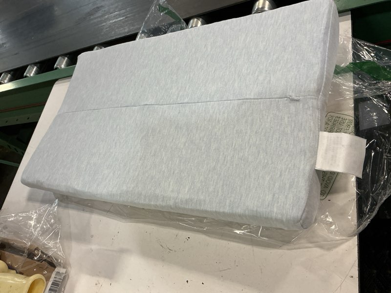 Condition photo showing As Is for serta perfect sleeper contoured changing pad with plush cover, grey