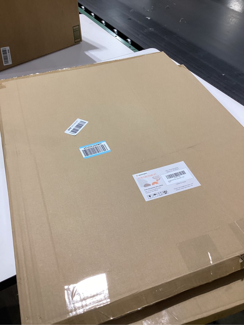 Condition photo showing New/Like New for upsimples 24x32 Poster Frame, Display Pictures 20x28 with Mat or 24 x 32 Without, Wall Hanging Picture Frames, Black, 1 Pack Black 24x32