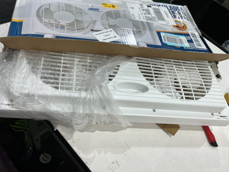 Condition photo showing As Is for seasons comfort twin window fan, reversible airflow control, 9 inch, 2 speeds, expandable, exhaust, dual fan - ideal for home, kitchen, bedroom & office