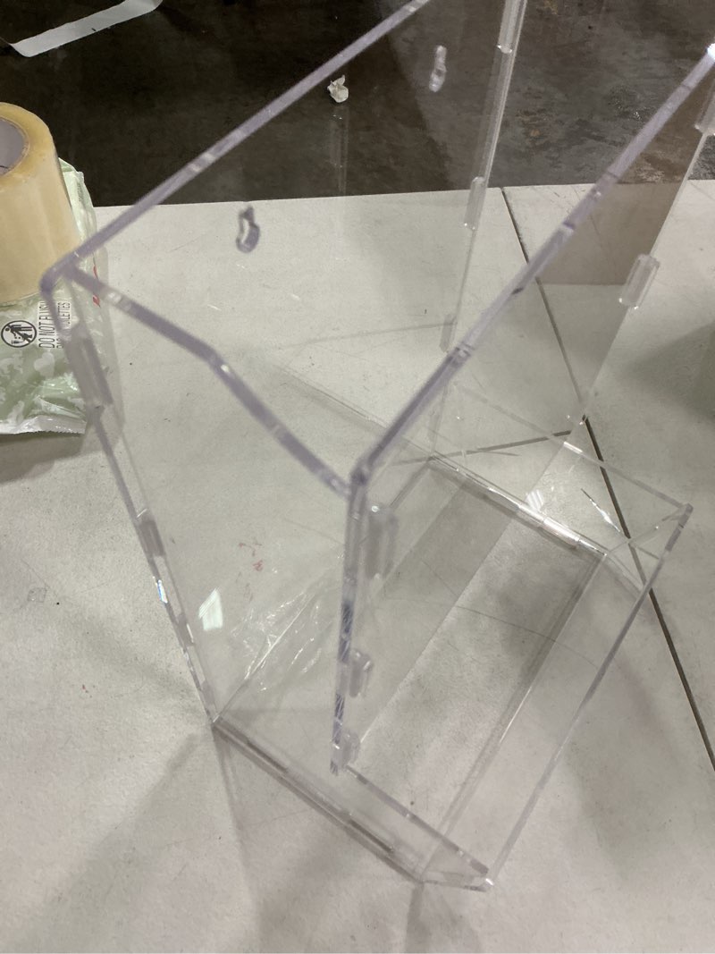 Condition photo showing As Is for acrylic display case or dispenser