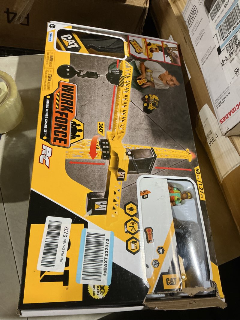 Condition photo showing New/Like New for cat construction workforce jumbo tower crane set, 50-inch rc crane toy with 360-degree rotation, hook and wrecking ball, light, skid steer and 4" figure, usb rechargeable, ages 5+ workforce jumbo crane