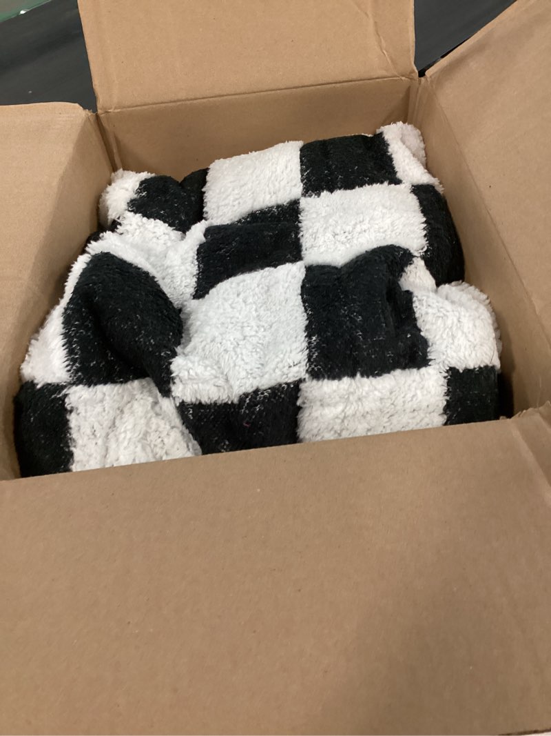 Condition photo showing As Is for Exclusivo Mezcla Checkered Knit Throw Blanket, Ultra Soft and Warm Reversible Woven Blankets, Cozy Snuggly Throw for Couch Bed and Home Decor, Black, 50"x60" Black Throw (50"x60")