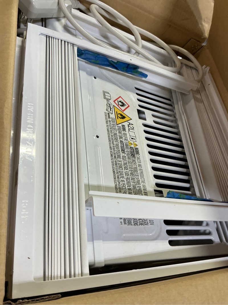 Condition photo showing As Is for Frigidaire 6,000 BTU Window Air Conditioner with Remote Control, Cools Up to 250 Sq. Ft., Quiet Operation, Eco Mode, 3 Fan Speeds, Auto Restart, White 6,000 BTU Electronic Controls