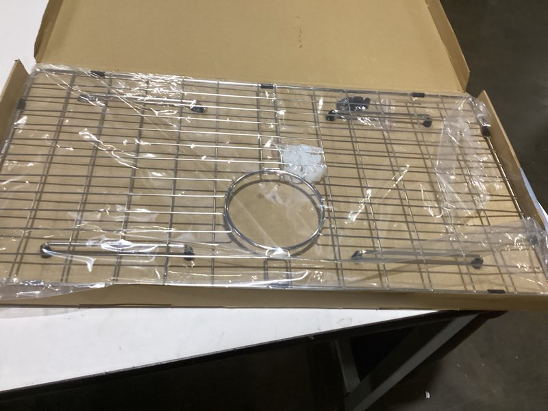 Condition photo showing Good Condition for 27-9/16" x 14-9/16" Sink Protector, Rear Drain with Corner Radius 3/16", Sink Grid - Rear Drain for Single Bowl Kitchen Sinks 27-9/16" x 14-9/16 Rear Drain