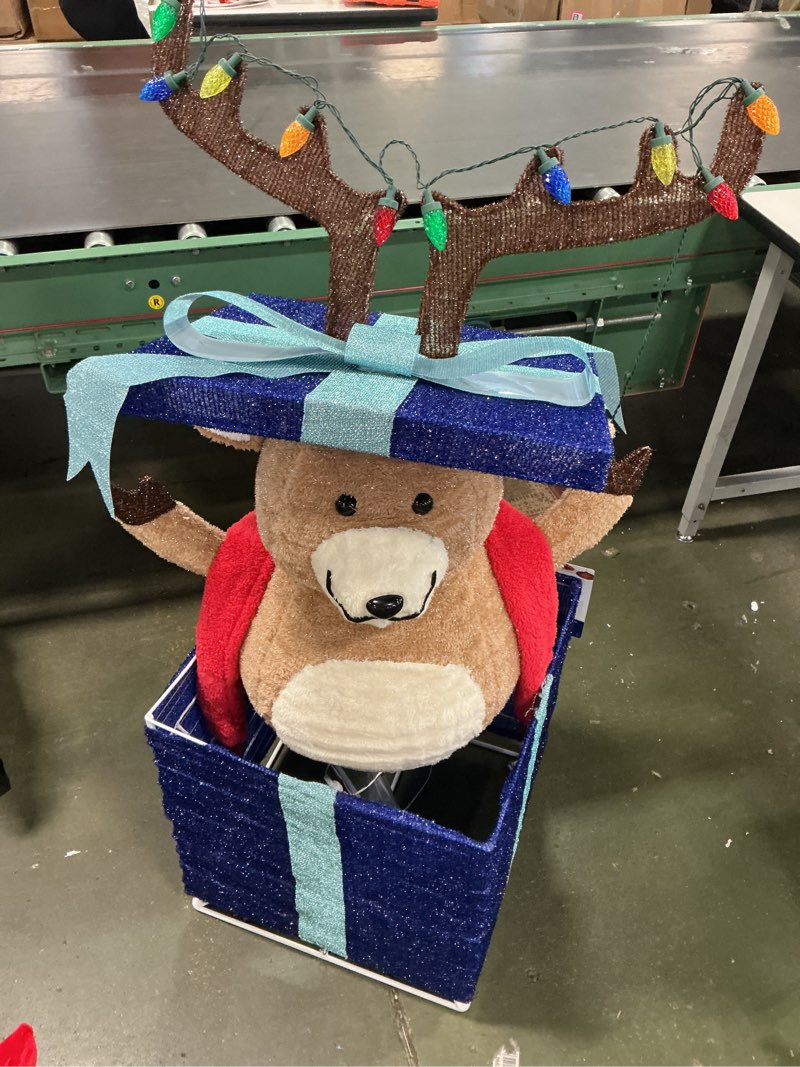 Condition photo showing As Is for Holiday Living 4-ft Animatronic LED Reindeer in Giftbox Yard Decoration