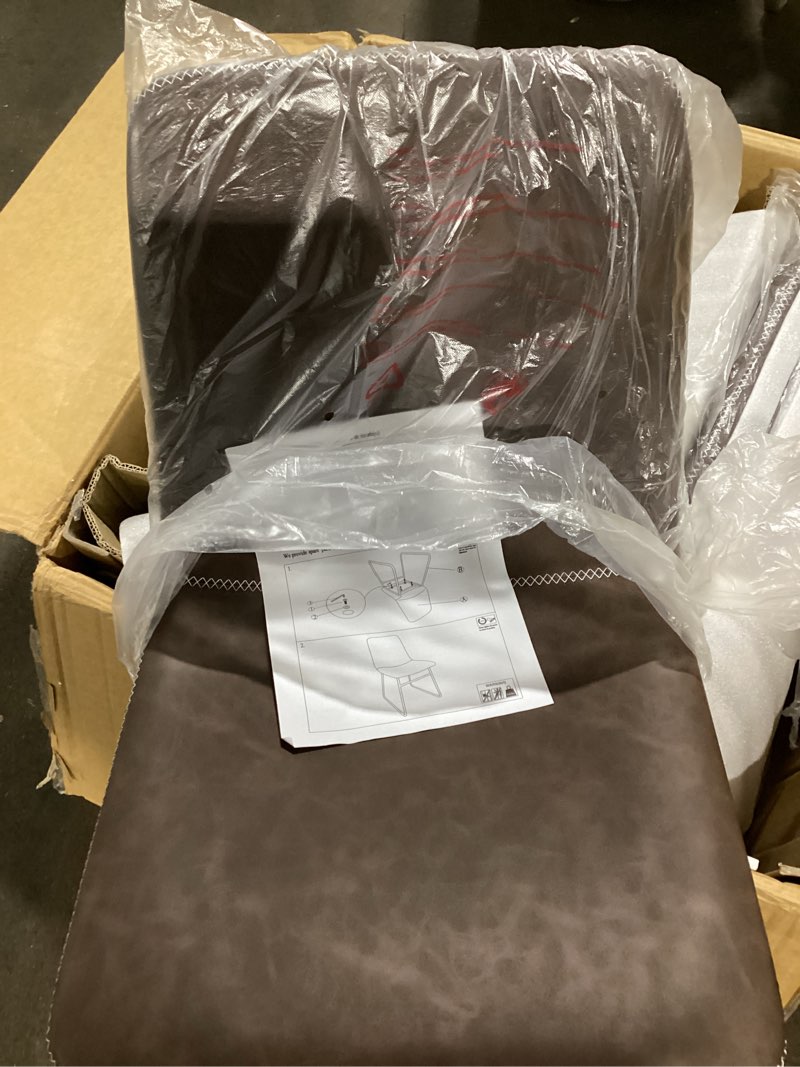 Condition photo showing Good Condition for similar to stock design.. brown faux leather chair.. set of four chairs.. brown and black benzara leather upholstered metal chair with decorative top stitching
