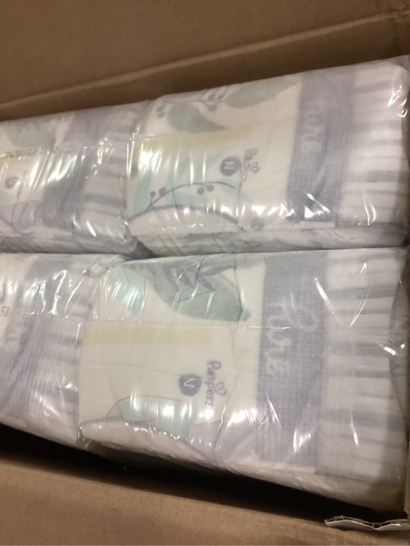 Condition photo showing Good Condition for Pampers Pure Protection Baby Diapers, Size 0 (10 lbs ), 128 Count, Up to 100% Leakproof, Premium Plant-based Skin Protection, Hypoallergenic Soft Diapers Newborn 128