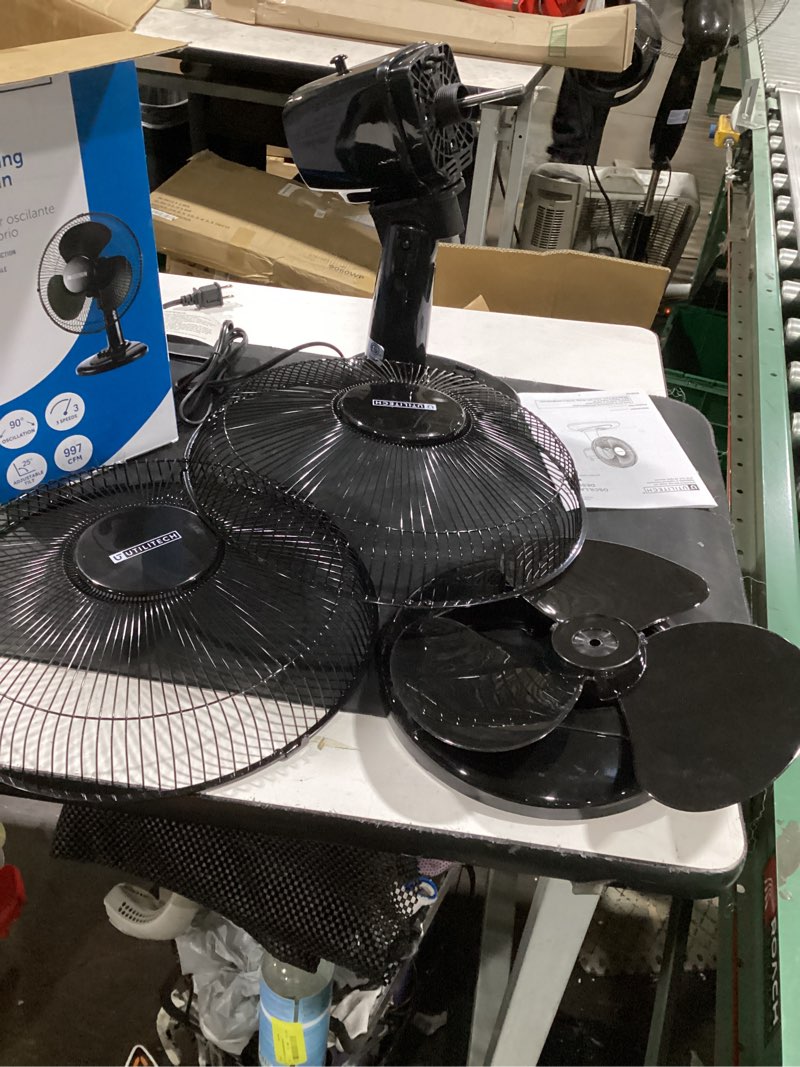 Condition photo showing As Is for (back piece missing) utilitech 12-in 120-volt 3-speed indoor black oscillating desk fan