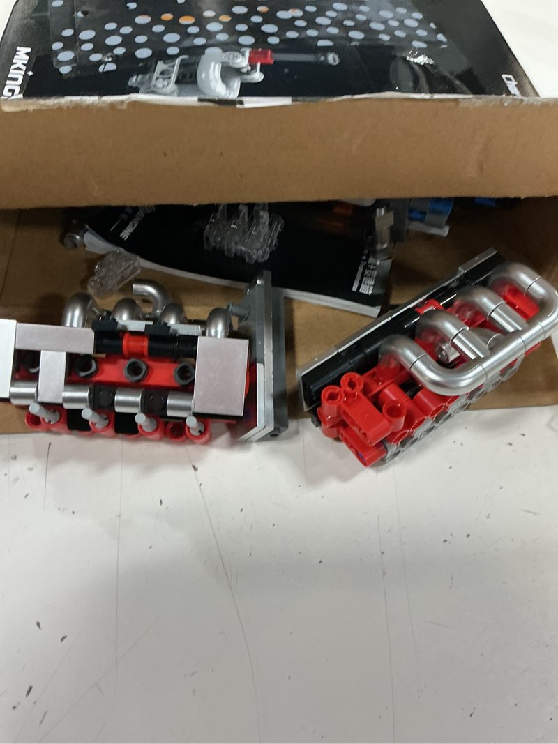 Condition photo showing As Is for mould king 10225 v8 engine model kit that runs- build your own stem v8 model engine with transmissio