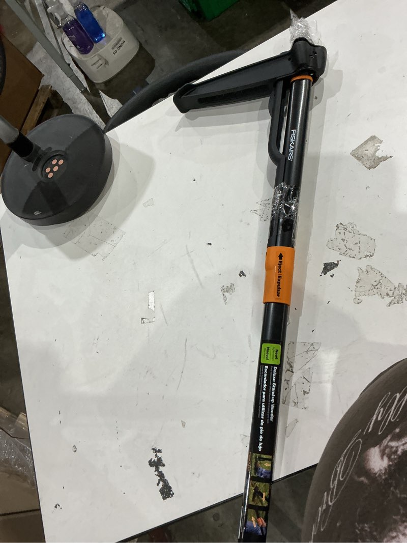 Condition photo showing As Is for fiskars 39.25 in. stainless steel weeder aluminum handle