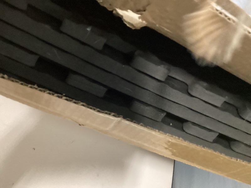 Condition photo showing As Is for ProsourceFit Puzzle Exercise Mat ½ in, EVA Interlocking Foam Floor Tiles for Home Gym, Mat for Home Workout Equipment, Floor Padding for Kids, Black, 24 in x 24 in x ½ in, 24 Sq Ft - 6 Tiles Black - 1/2 Inch - 24 Sq Ft - 6 Tiles