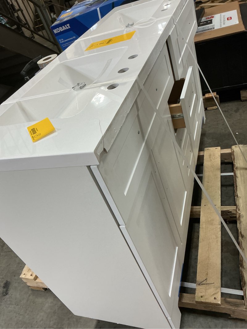 Condition photo showing As Is for  style selections cauley 60-in true white double sink bathroom vanity with white cultured marble