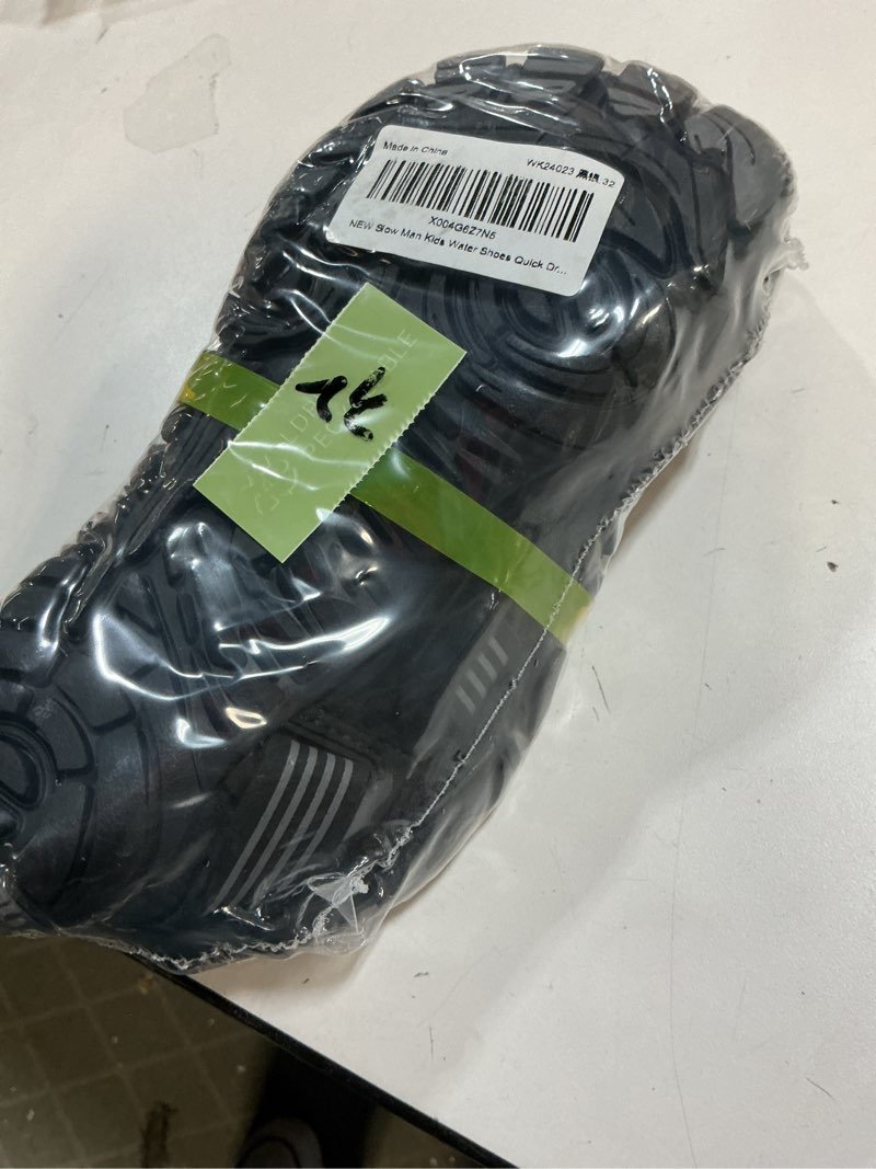 Condition photo showing New/Like New for Slow Man Kids Water Shoes Quick Dry Non-Slip Barefoot Shoes Swim Beach Outdoor Pool Shoes for Boys Girls Lightweight Breathable 4.5 Big Kid Black Silver