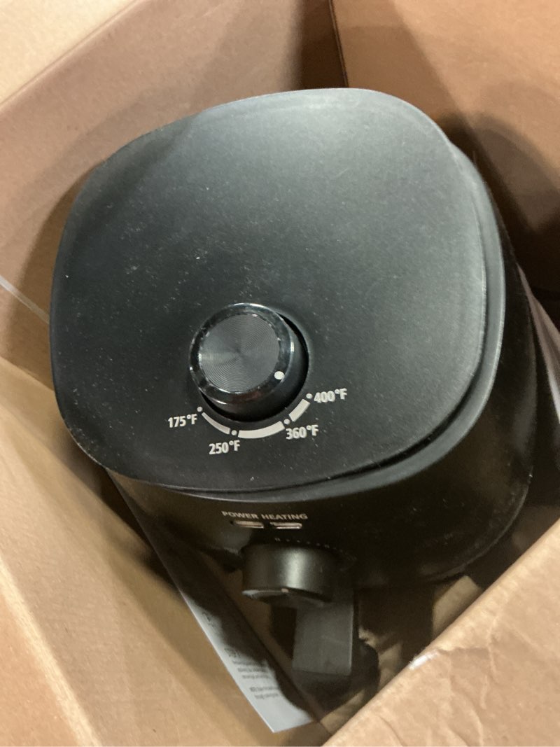 Condition photo showing As Is for mainstays 2.2 qt air fryer in arctic black with non-stick basket